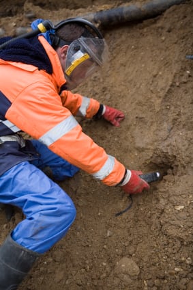 EHS expert tests soil for contaminants 