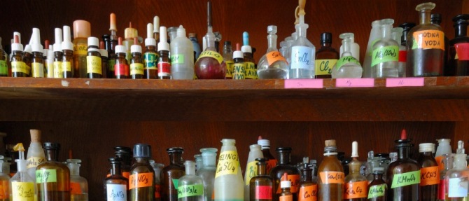 Zoomed in image of chemical bottles and labels