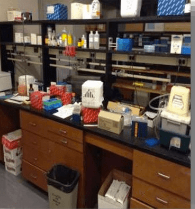 Laboratory counter and shelf with  equipment prepared for lab decontamination 
