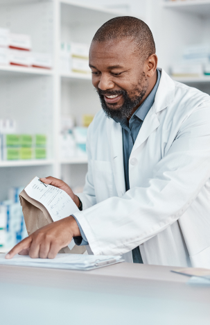Pharmacist handing out medication