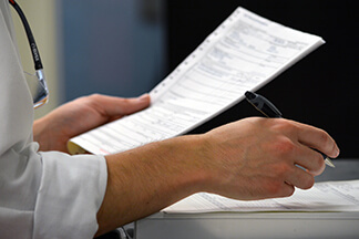 Hands holding a business document