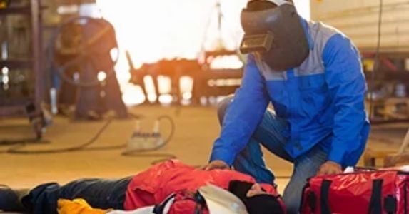 facility worker performing CPR