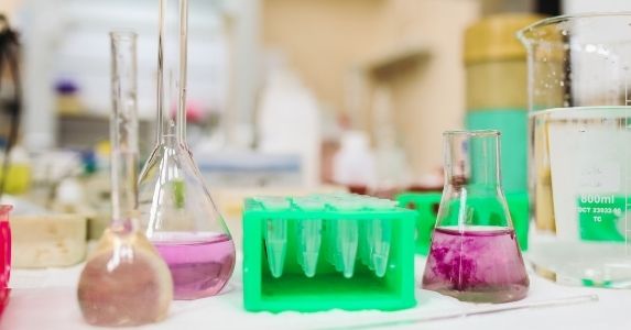 chemicals in vials on lab table