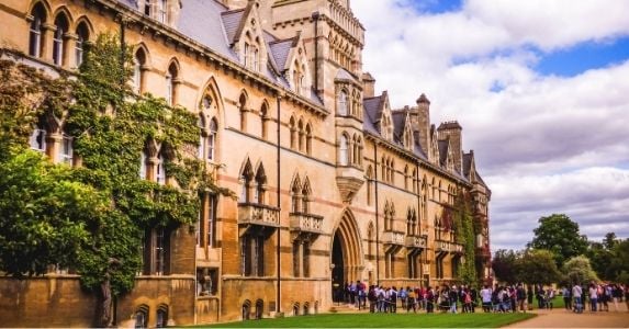 University building exterior with students outside