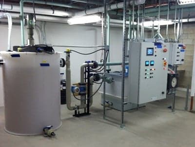 Wastewater pretreatment tank system inside facility 