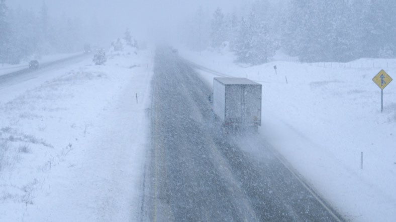 truck-snowy-highway-holiday-safety